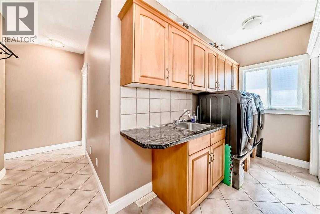 Single Family House for Sale in  Simcoe Close SW Signal Hill Calgary 