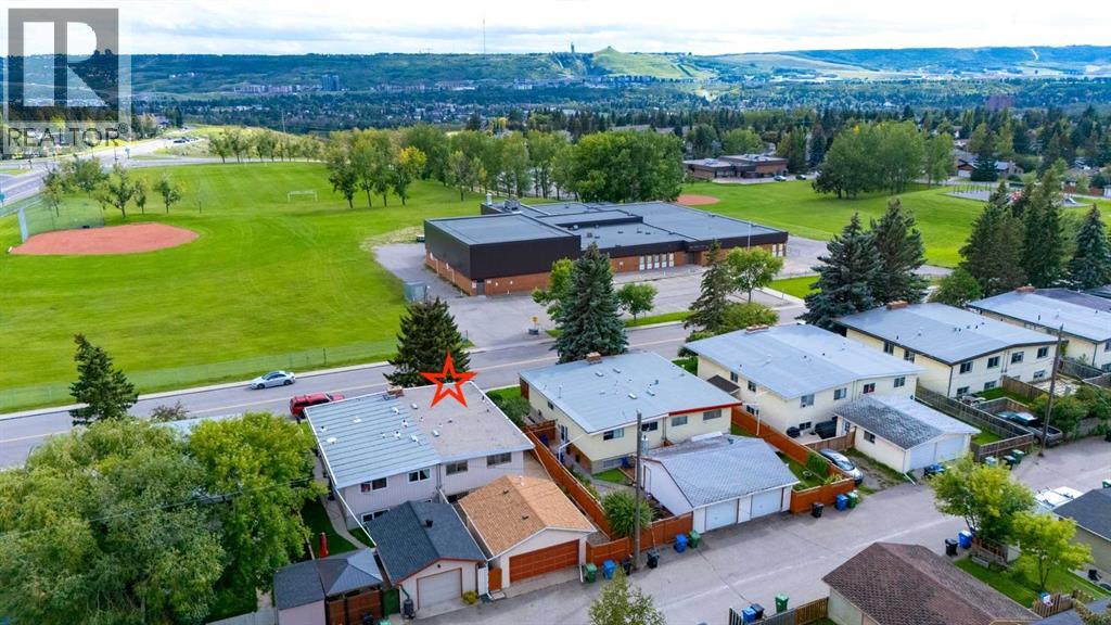 Single Family House Bi-level for Sale in  Silver Mead Road NW Silver Springs Calgary 