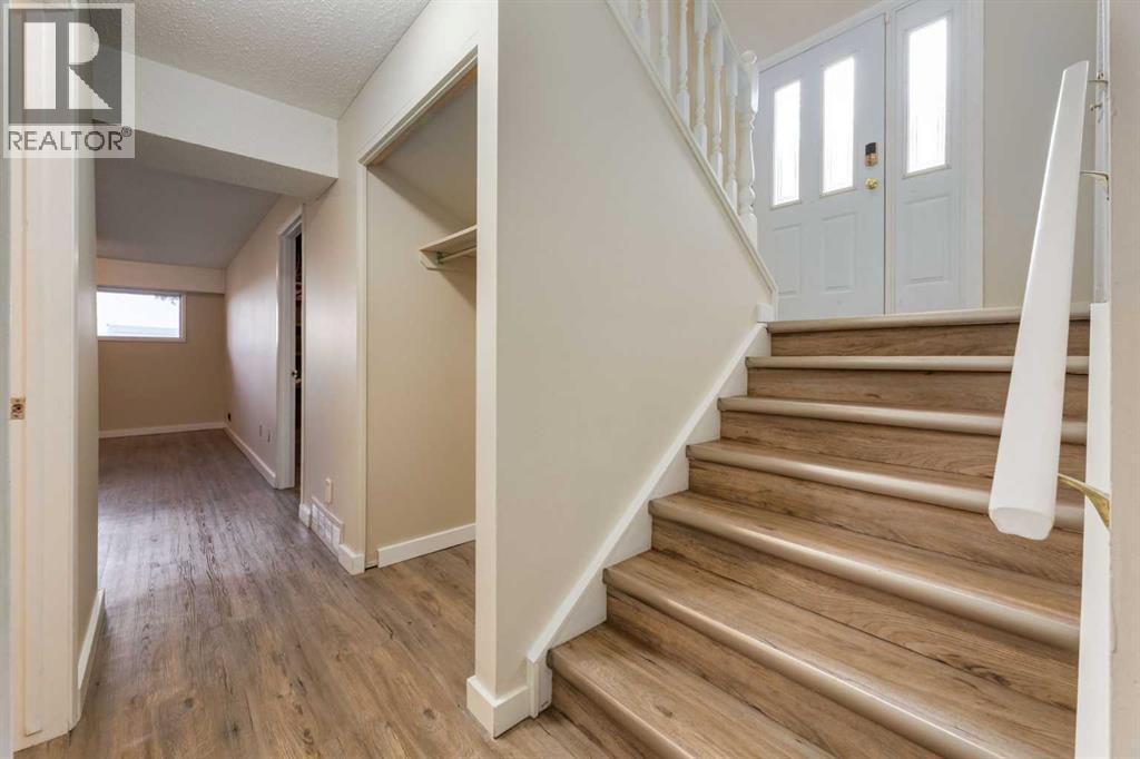 Single Family House Bi-level for Sale in  Silver Mead Road NW Silver Springs Calgary 