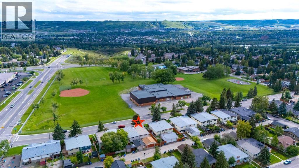 Single Family House Bi-level for Sale in  Silver Mead Road NW Silver Springs Calgary 