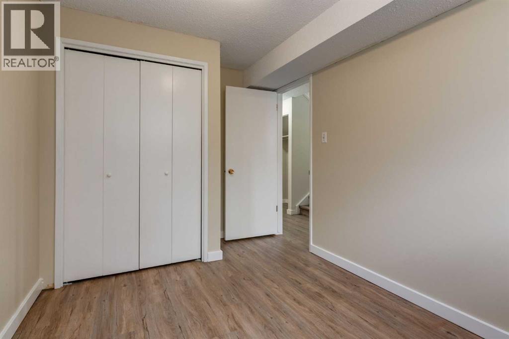 Single Family House Bi-level for Sale in  Silver Mead Road NW Silver Springs Calgary 