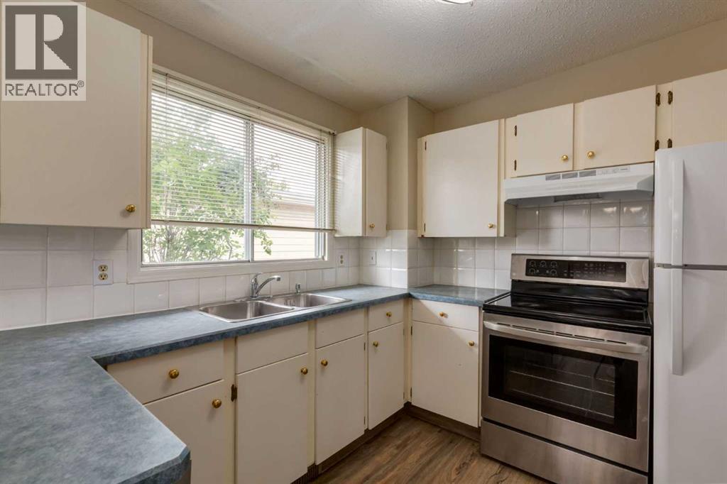 Single Family House Bi-level for Sale in  Silver Mead Road NW Silver Springs Calgary 