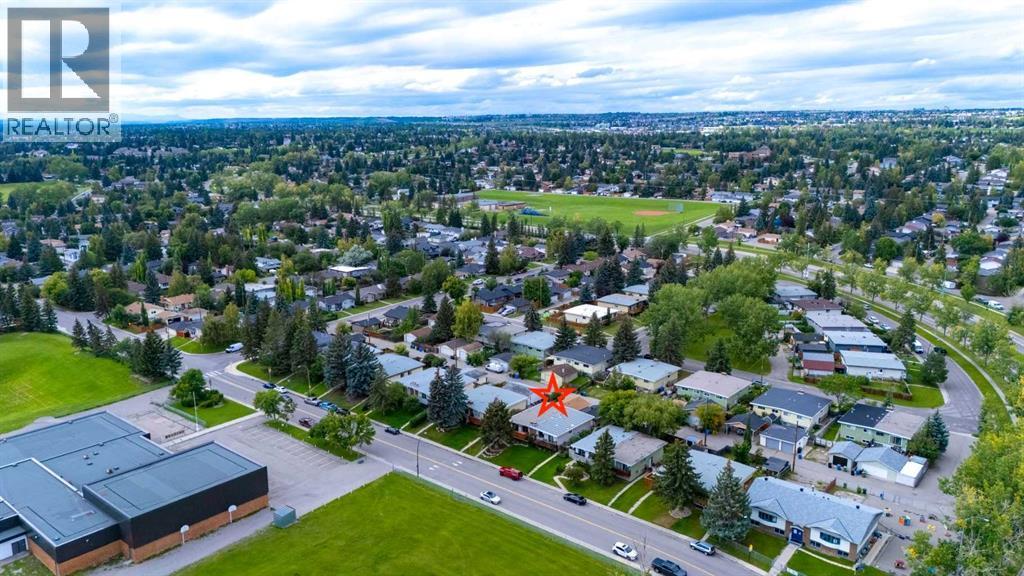 Single Family House Bi-level for Sale in  Silver Mead Road NW Silver Springs Calgary 