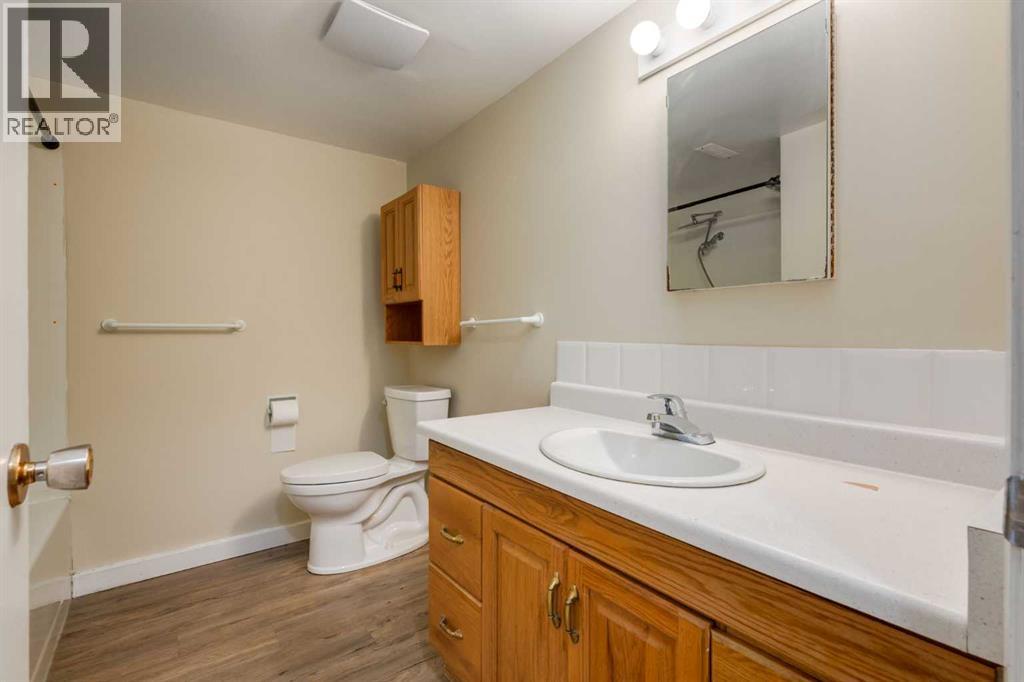 Single Family House Bi-level for Sale in  Silver Mead Road NW Silver Springs Calgary 