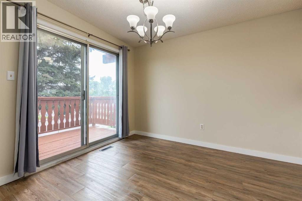 Single Family House Bi-level for Sale in  Silver Mead Road NW Silver Springs Calgary 