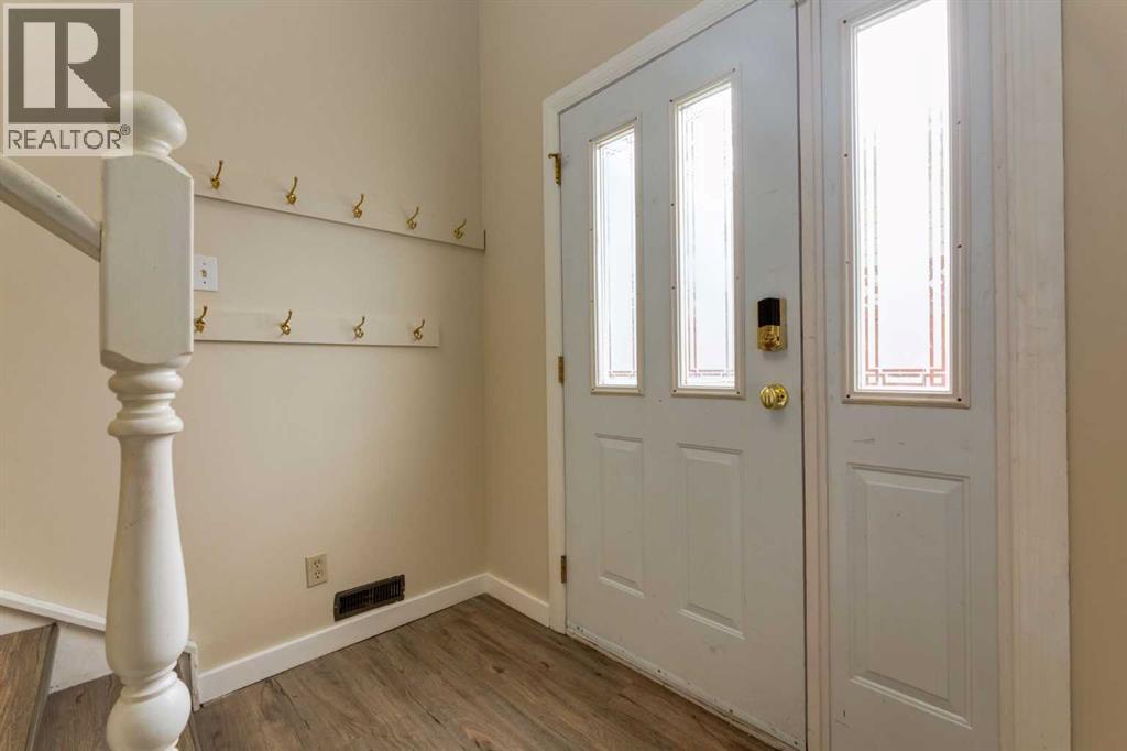 Single Family House Bi-level for Sale in  Silver Mead Road NW Silver Springs Calgary 