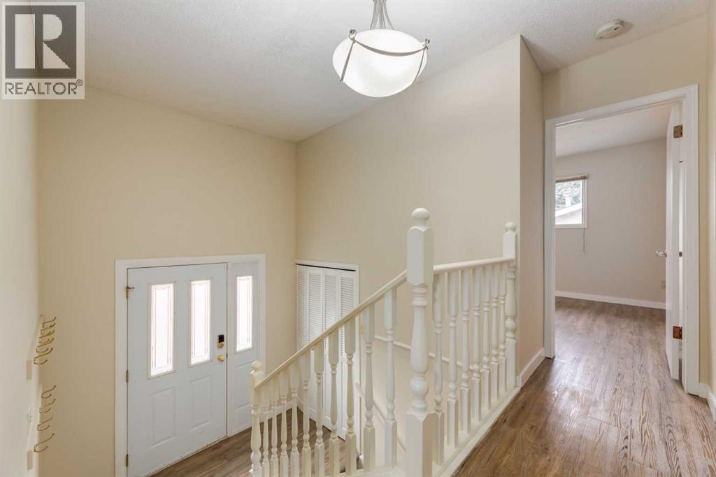 Single Family House Bi-level for Sale in  Silver Mead Road NW Silver Springs Calgary 