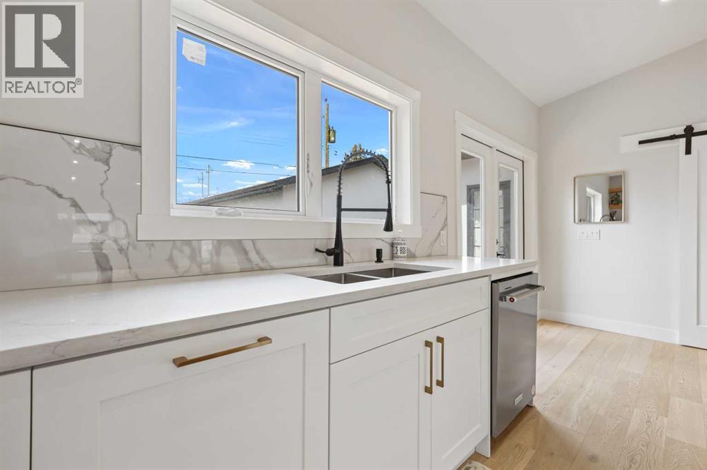 Single Family House Bungalow for Sale in  Breen Crescent NW Brentwood Calgary 