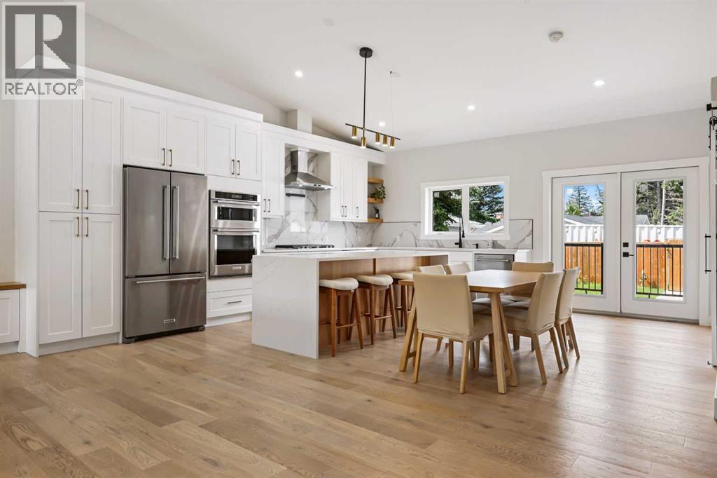 Single Family House Bungalow for Sale in  Breen Crescent NW Brentwood Calgary 
