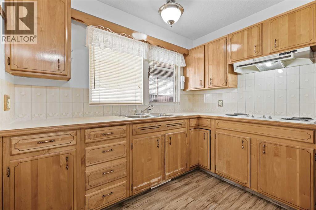 Single Family House Bungalow for Sale in  Archwood Road SE Acadia Calgary 