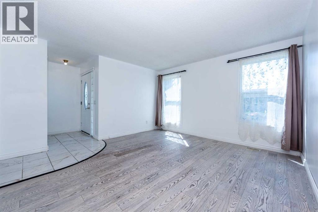 Single Family House Bi-level for Sale in  Whitworth Way NE Whitehorn Calgary 