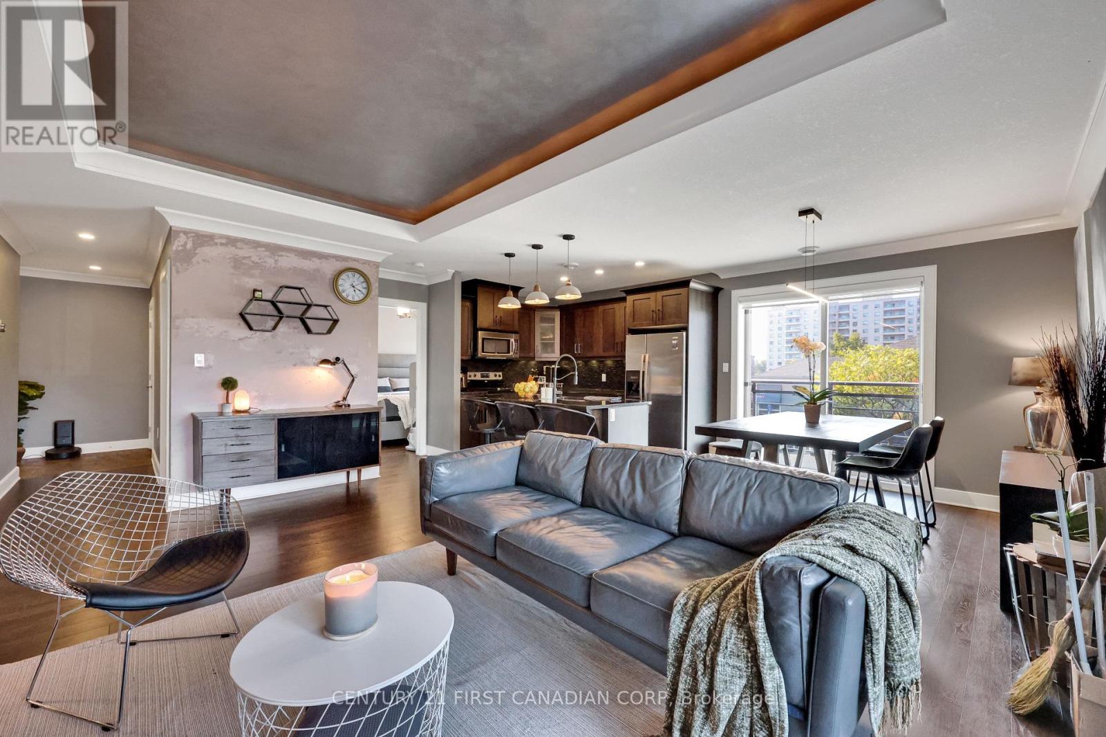 Photo 2 of 211 340 Sugarcreek Trail, London North ON
