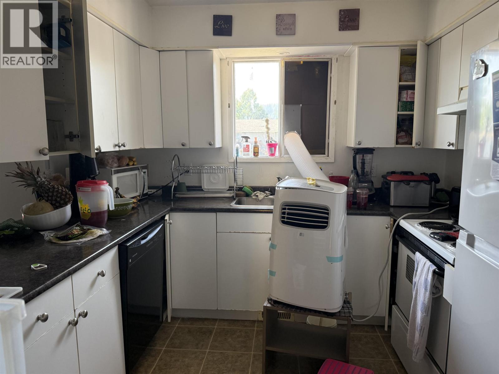 Photo 1 of 4565 1st Avenue, Prince George BC