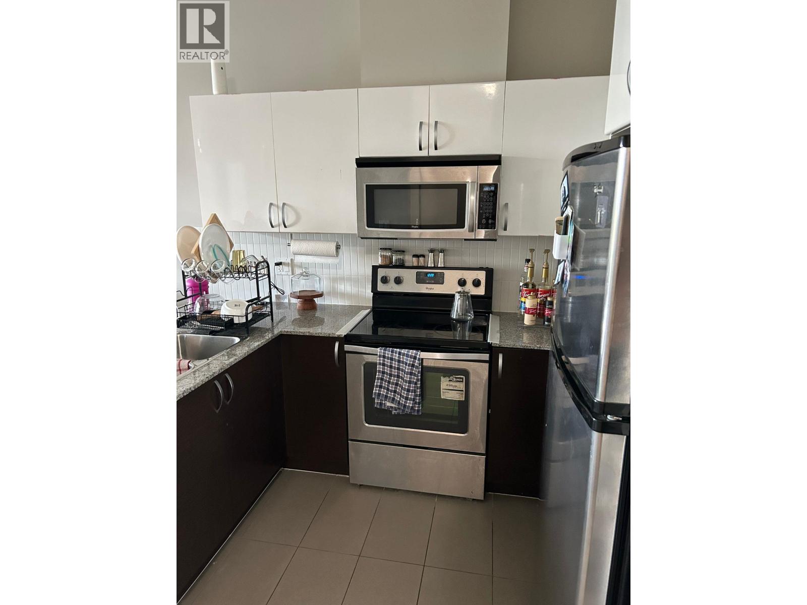 Photo 2 of 207 5605 Hampton Place, Vancouver BC