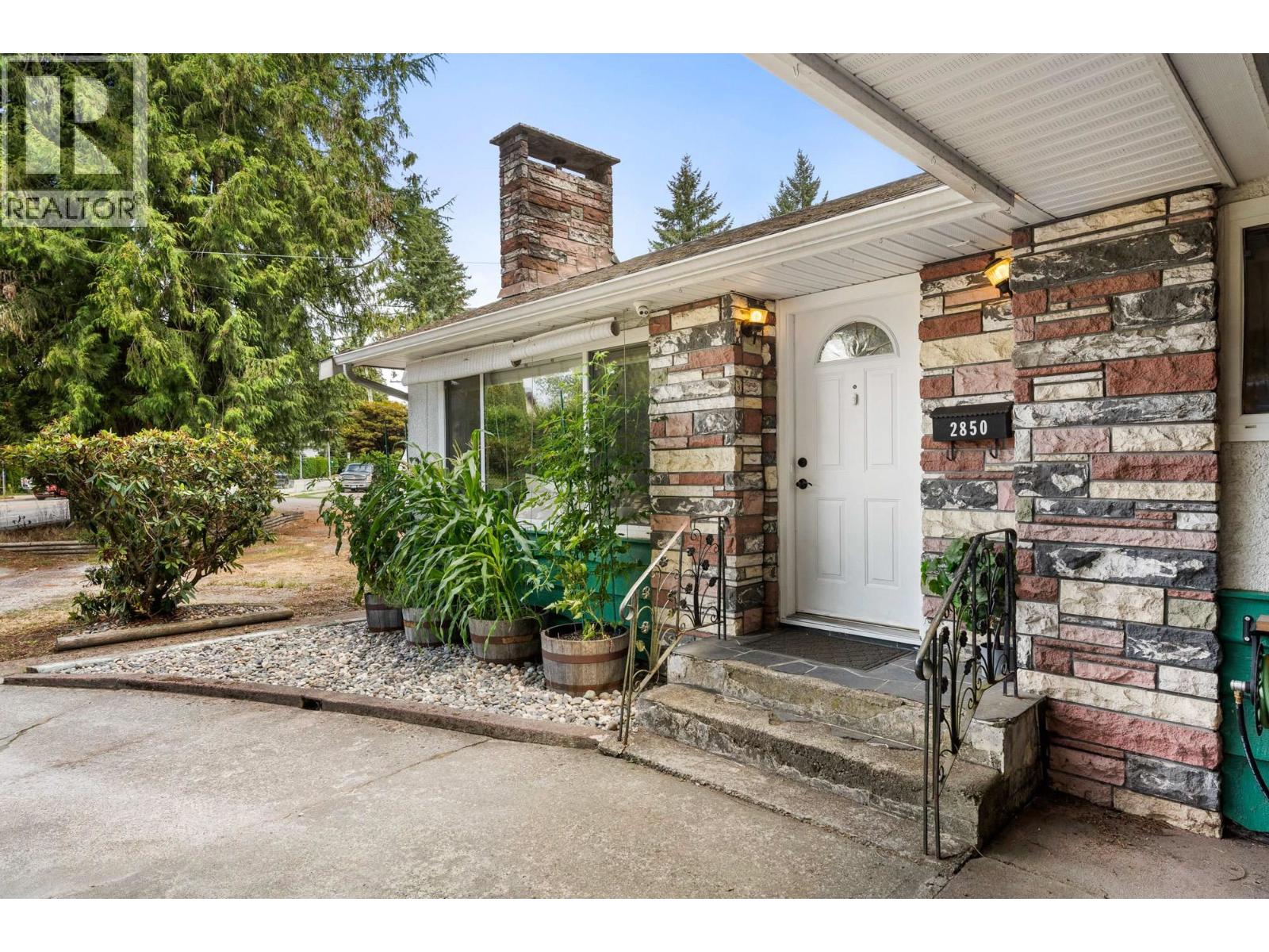 Photo 1 of 2850 Coast Meridian Road, Port Coquitlam BC