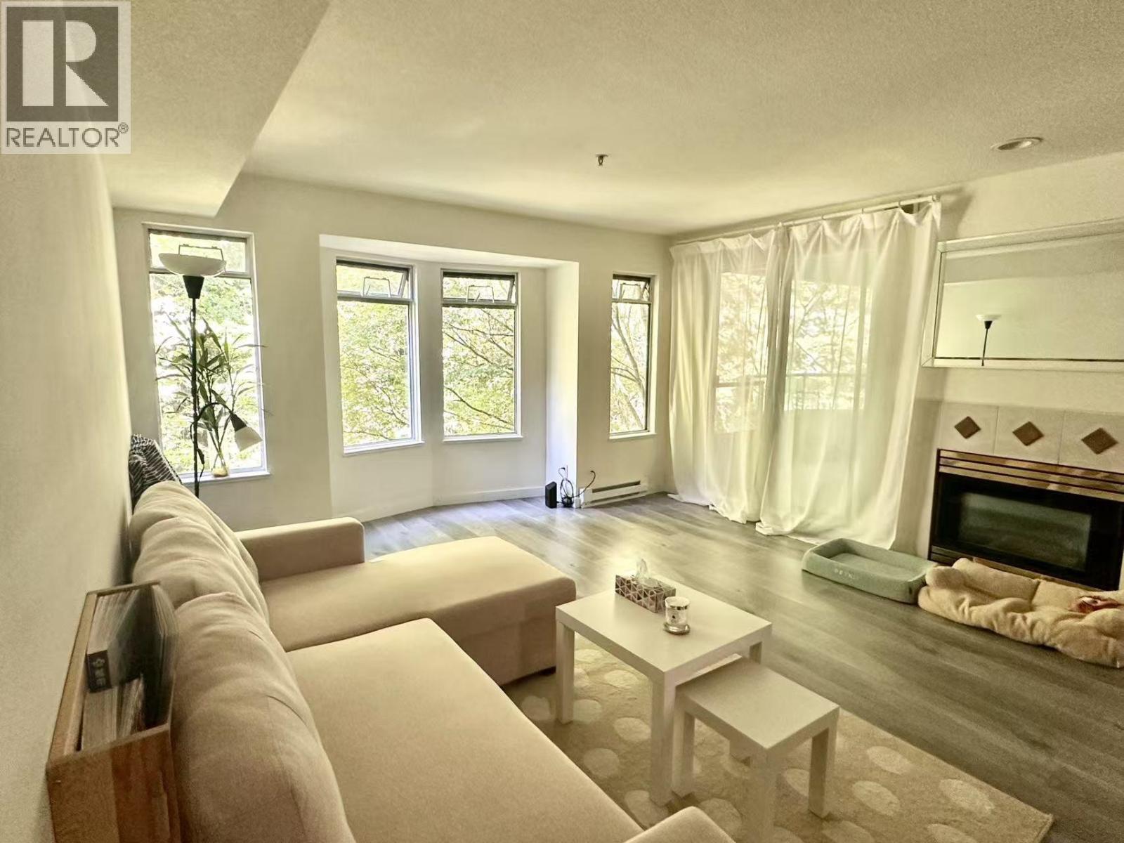 Photo 2 of 409 6737 Station Hill Court, Burnaby BC