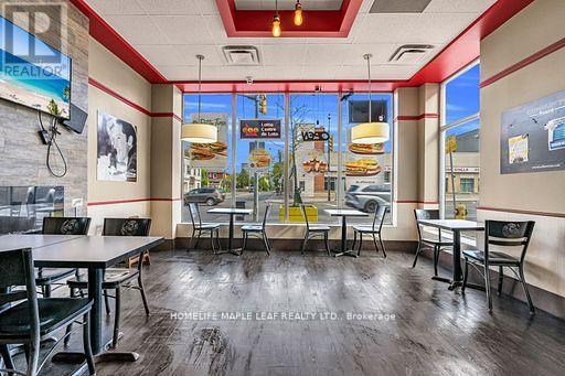 Photo 3 of 1471 Eglinton Avenue W, Toronto ON