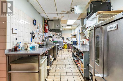 Photo 4 of 1471 Eglinton Avenue W, Toronto ON