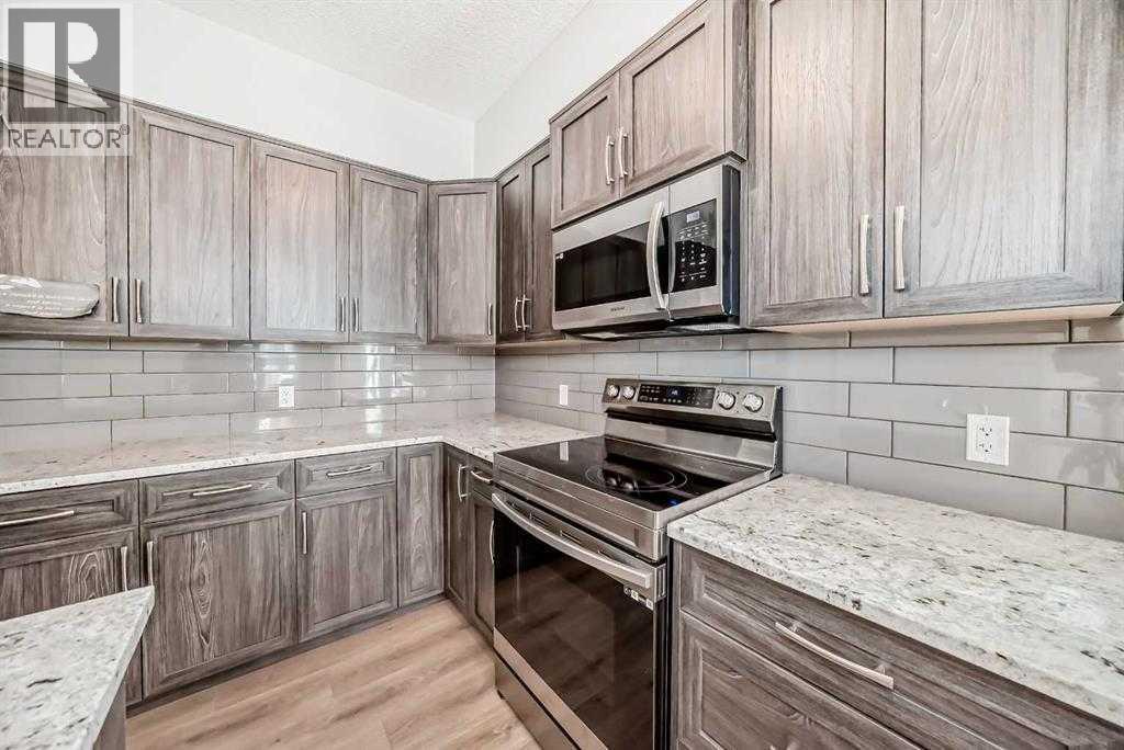 Photo 7 of 401 250 Fireside View, Cochrane AB