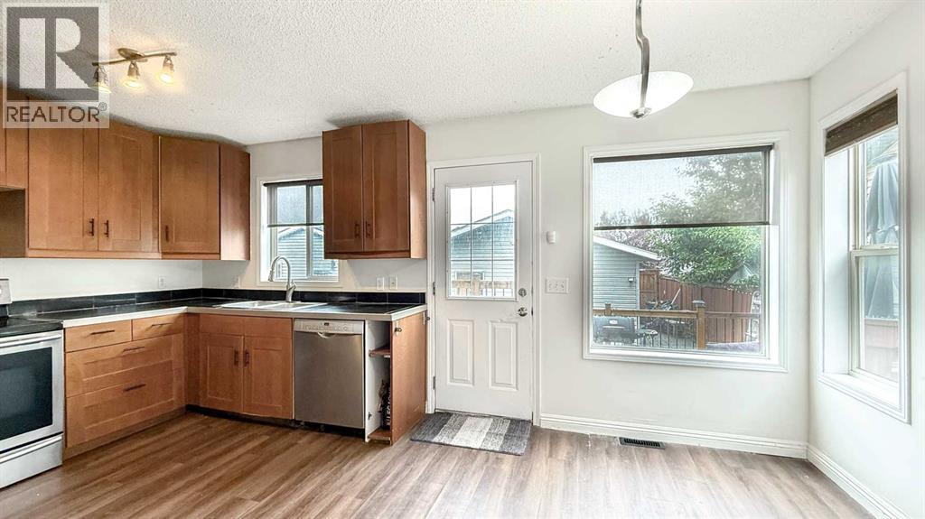 Single Family House for Sale in  Mt Aberdeen Link SE McKenzie Lake Calgary 