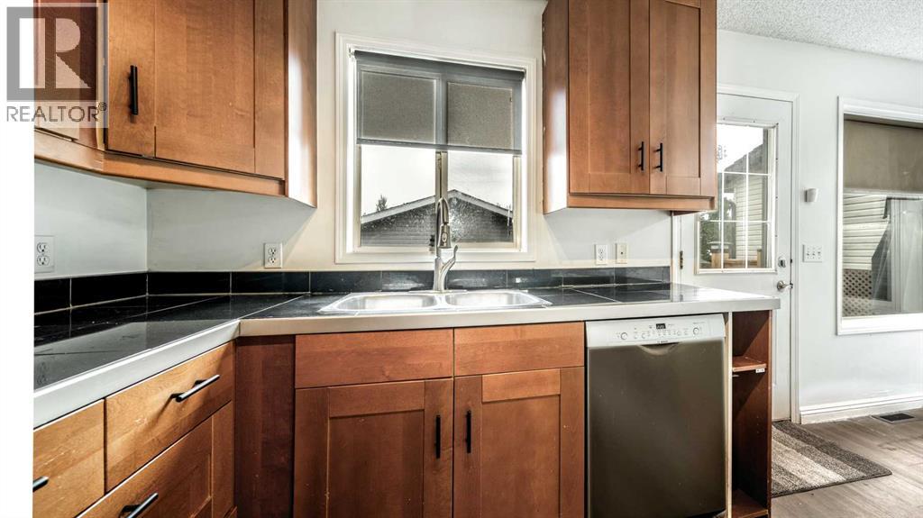 Single Family House for Sale in  Mt Aberdeen Link SE McKenzie Lake Calgary 