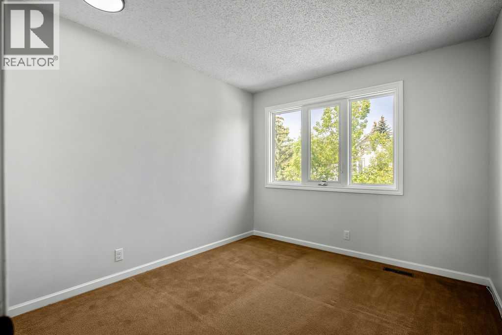 Single Family House for Sale in  Coachway Green SW Coach Hill Calgary 
