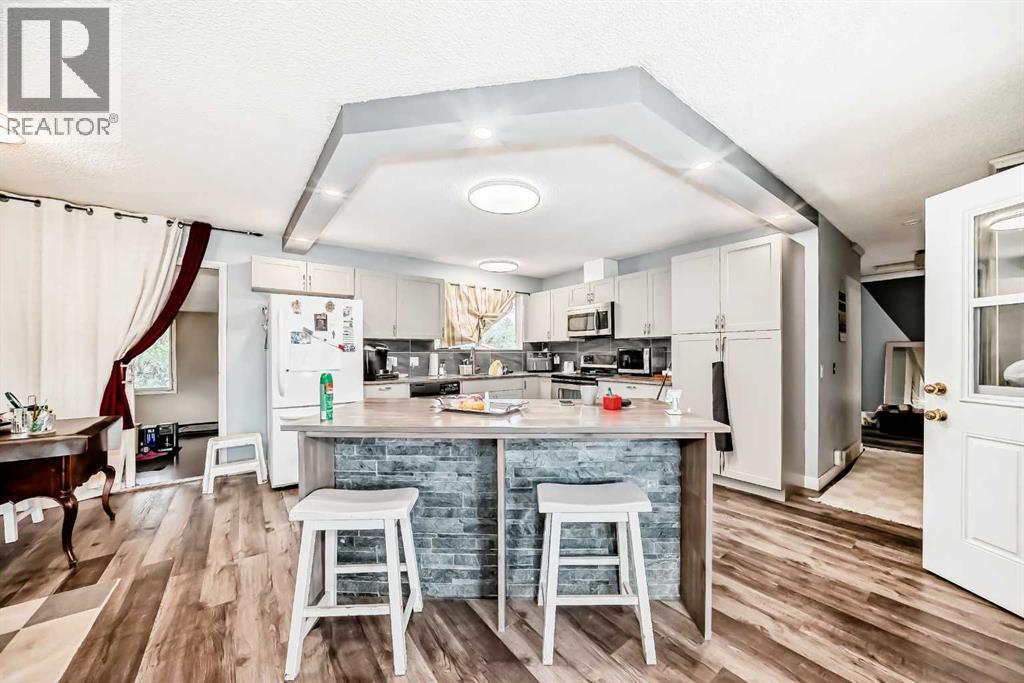 Single Family House Bi-level for Sale in  Maryvale Way NE Marlborough Calgary 