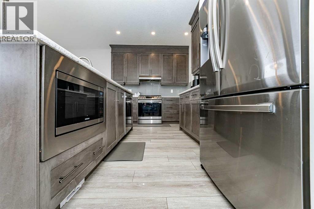 Photo 14 of 717 Windrow Manor Sw, Airdrie AB