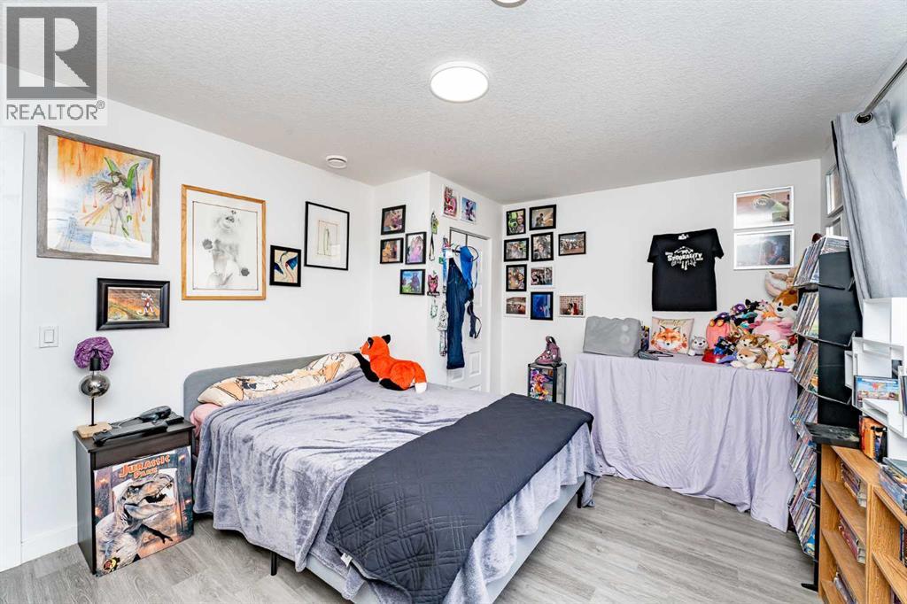 Photo 37 of 717 Windrow Manor Sw, Airdrie AB