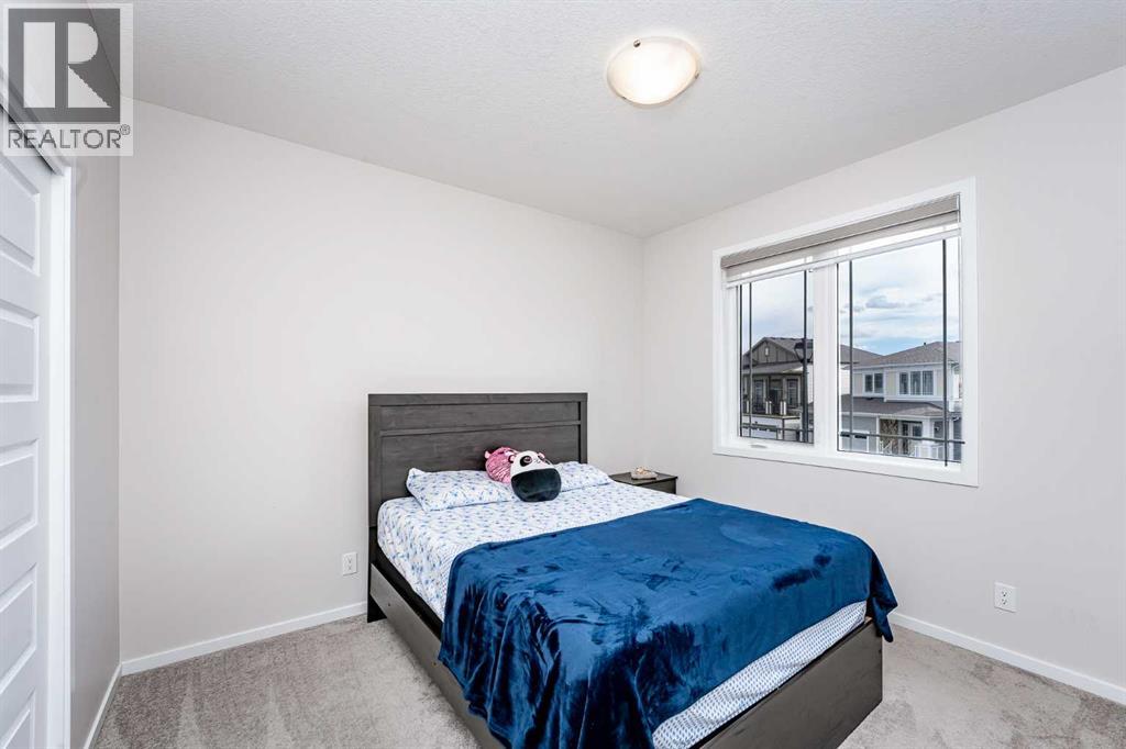 Photo 20 of 717 Windrow Manor Sw, Airdrie AB