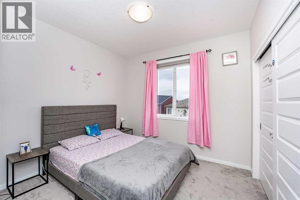 Photo 24 of 717 Windrow Manor Sw, Airdrie AB
