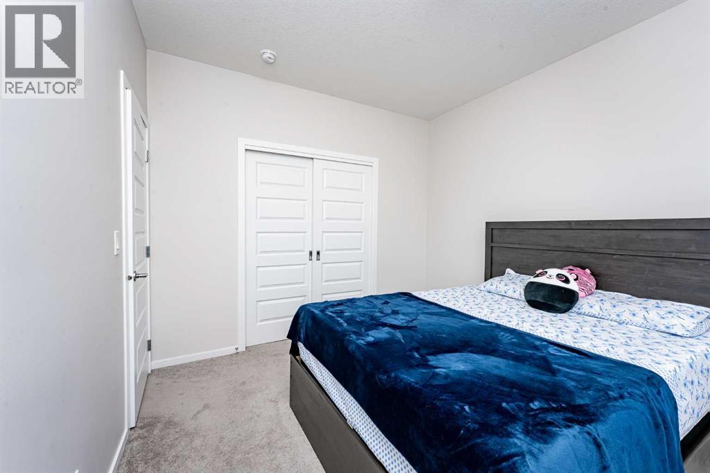 Photo 21 of 717 Windrow Manor Sw, Airdrie AB