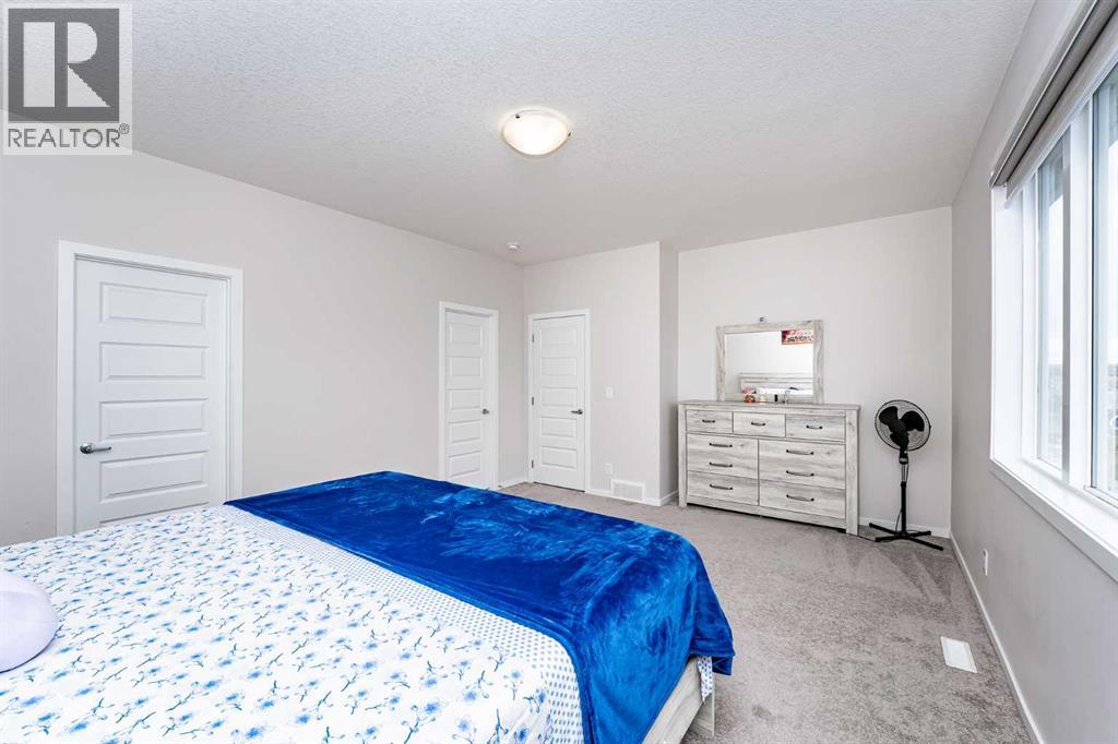 Photo 28 of 717 Windrow Manor Sw, Airdrie AB