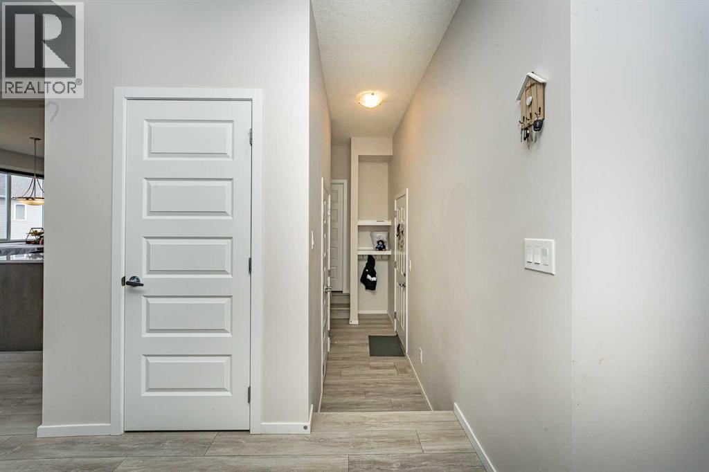 Photo 6 of 717 Windrow Manor Sw, Airdrie AB