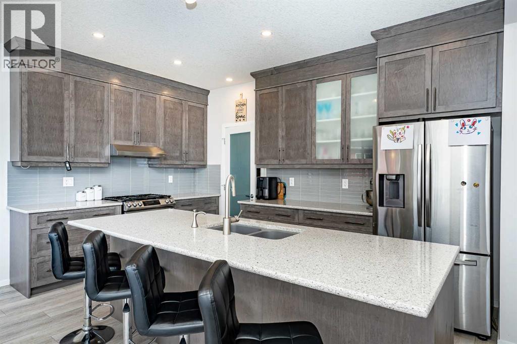 Photo 11 of 717 Windrow Manor Sw, Airdrie AB