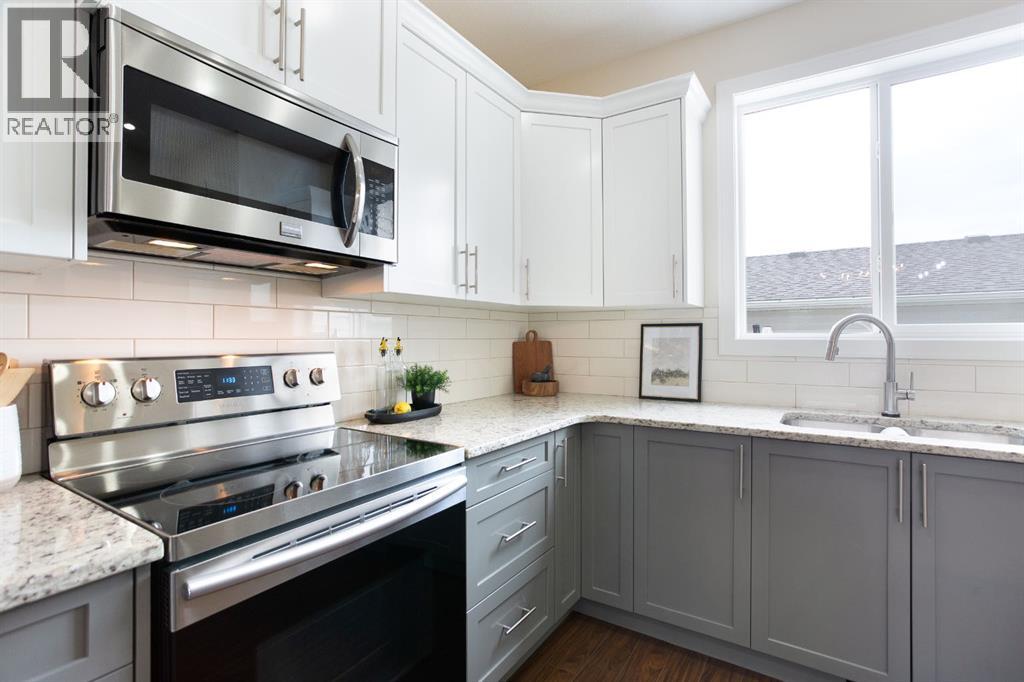 Photo 13 of 154 Cooperswood Place Sw, Airdrie AB