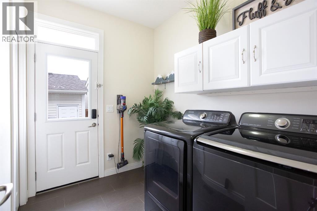 Photo 4 of 154 Cooperswood Place Sw, Airdrie AB
