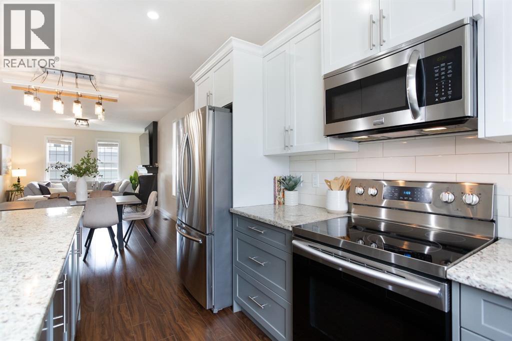 Photo 3 of 154 Cooperswood Place Sw, Airdrie AB