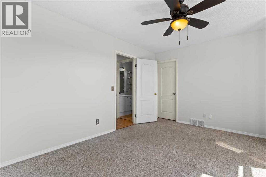 Photo 13 of 911 Arbour Lake Road Nw, Calgary AB
