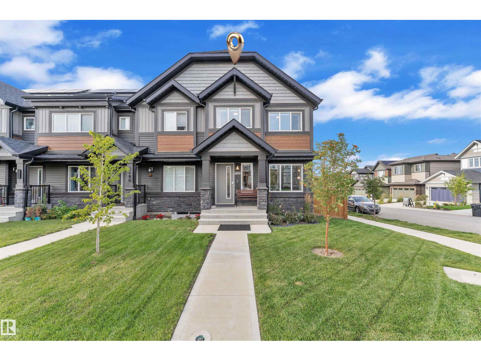 Photo 16 of 2404 Trumpter Wy Nw, Edmonton AB