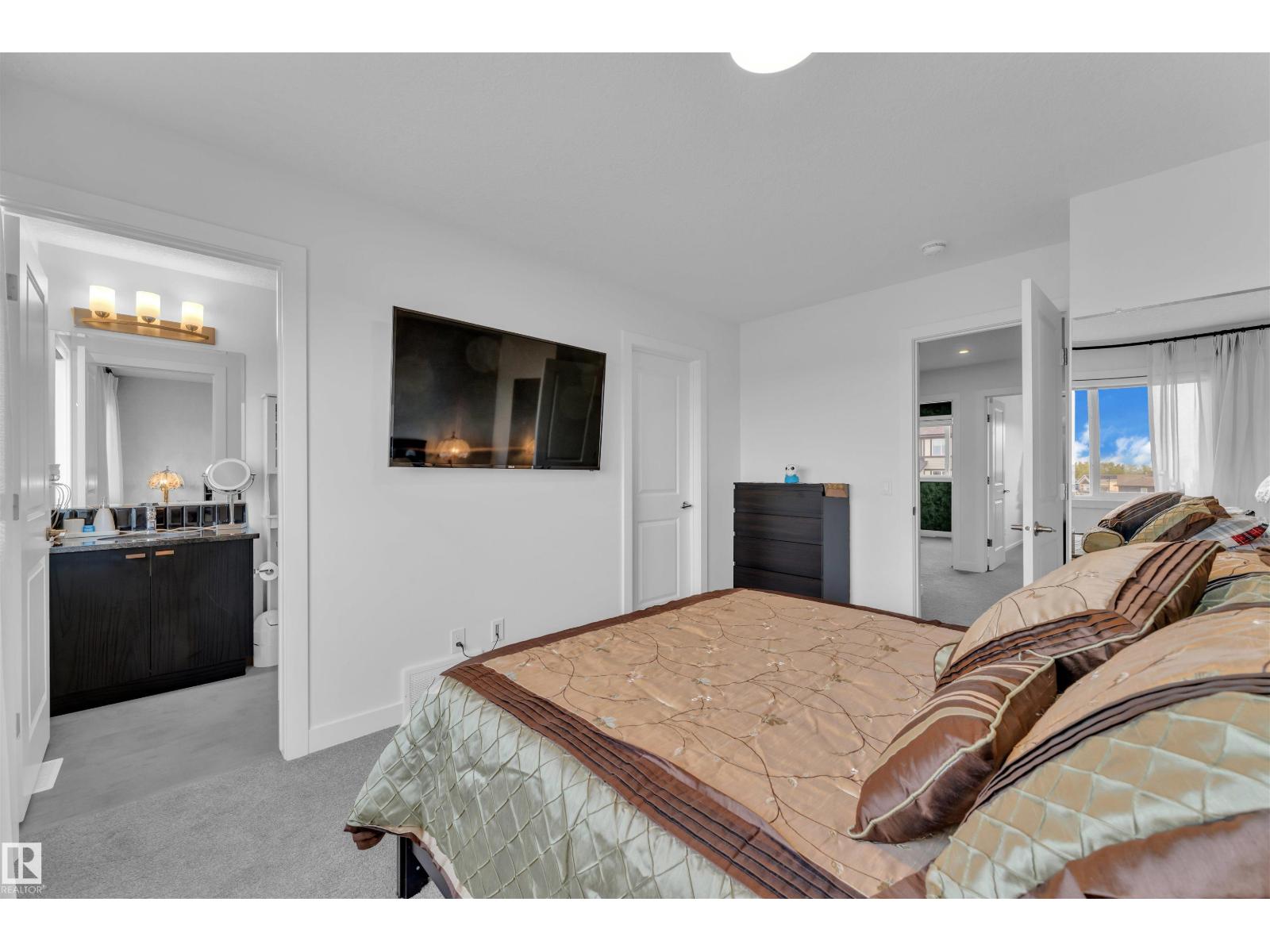 Photo 10 of 2404 Trumpter Wy Nw, Edmonton AB