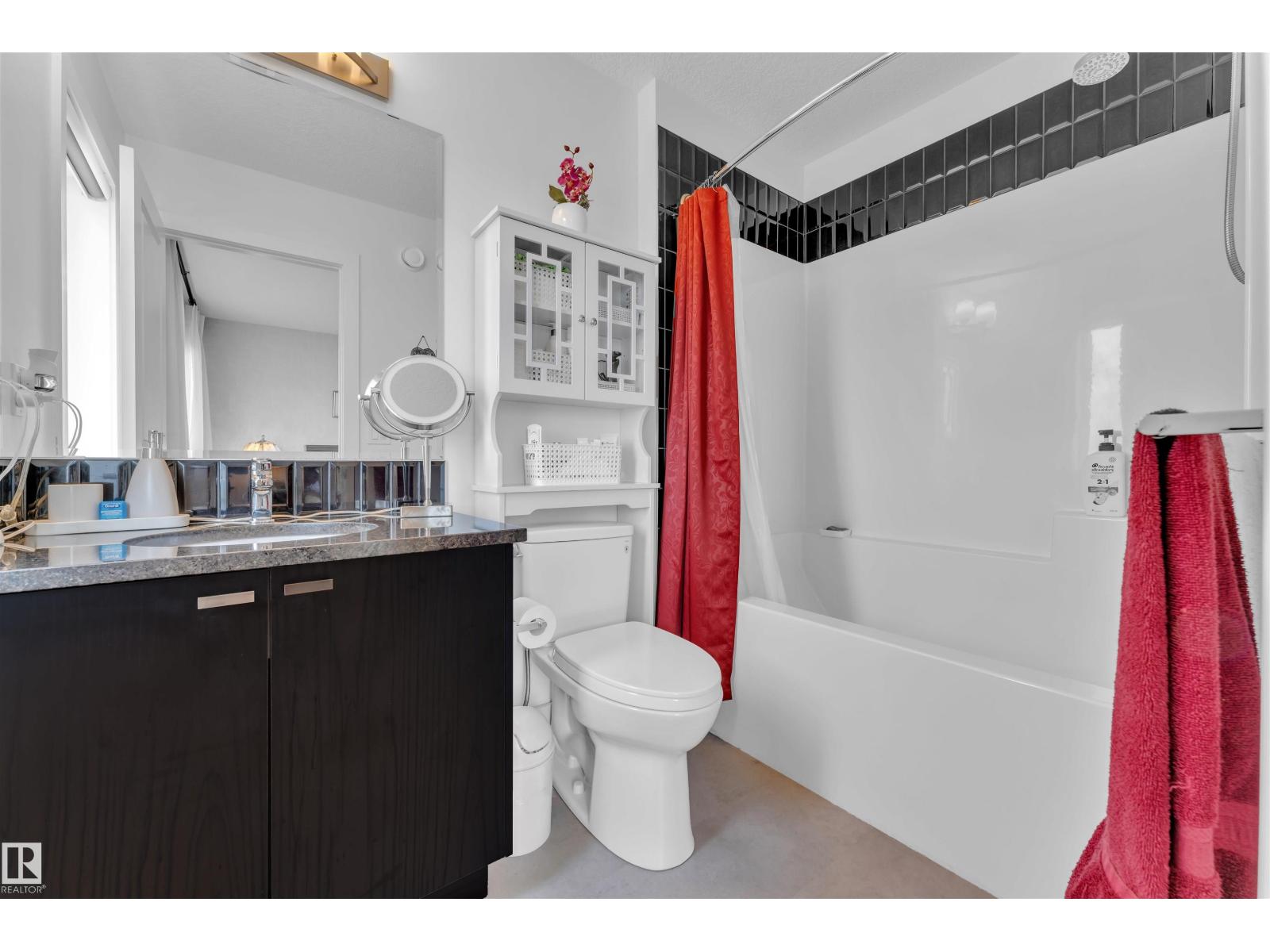 Photo 5 of 2404 Trumpter Wy Nw, Edmonton AB