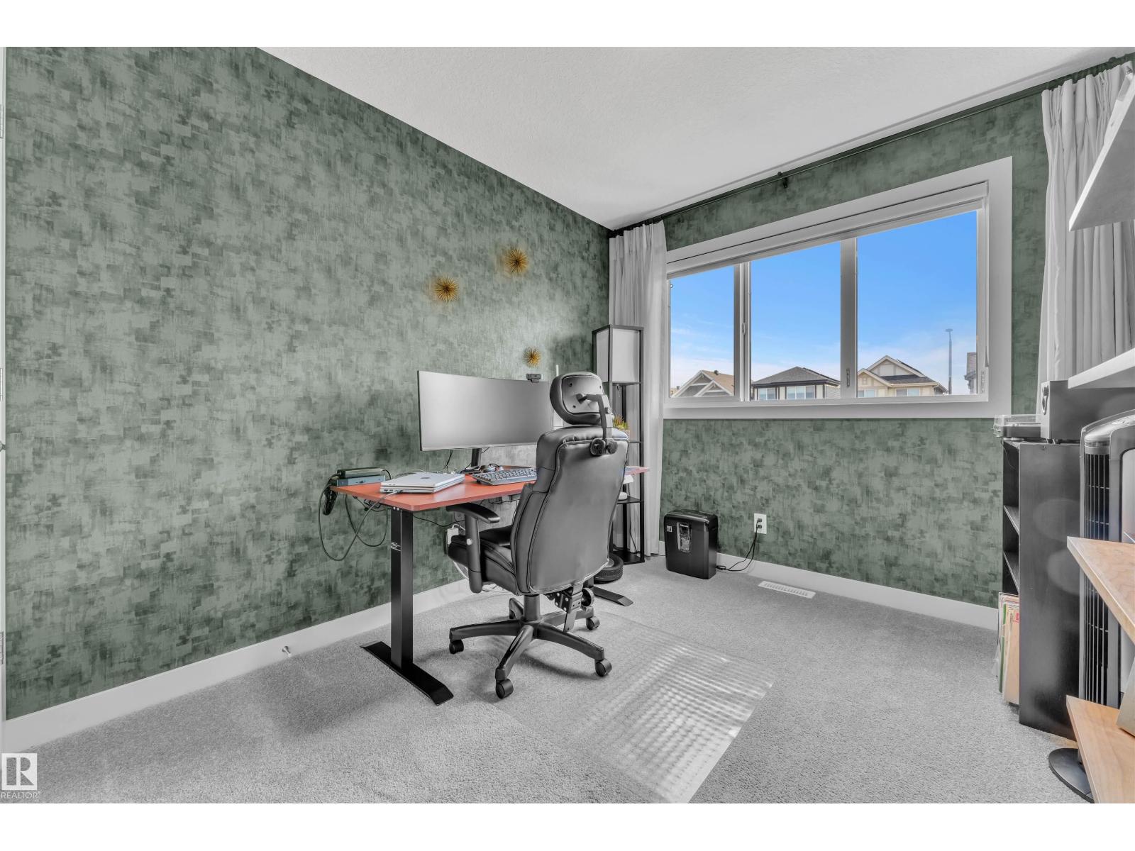 Photo 3 of 2404 Trumpter Wy Nw, Edmonton AB