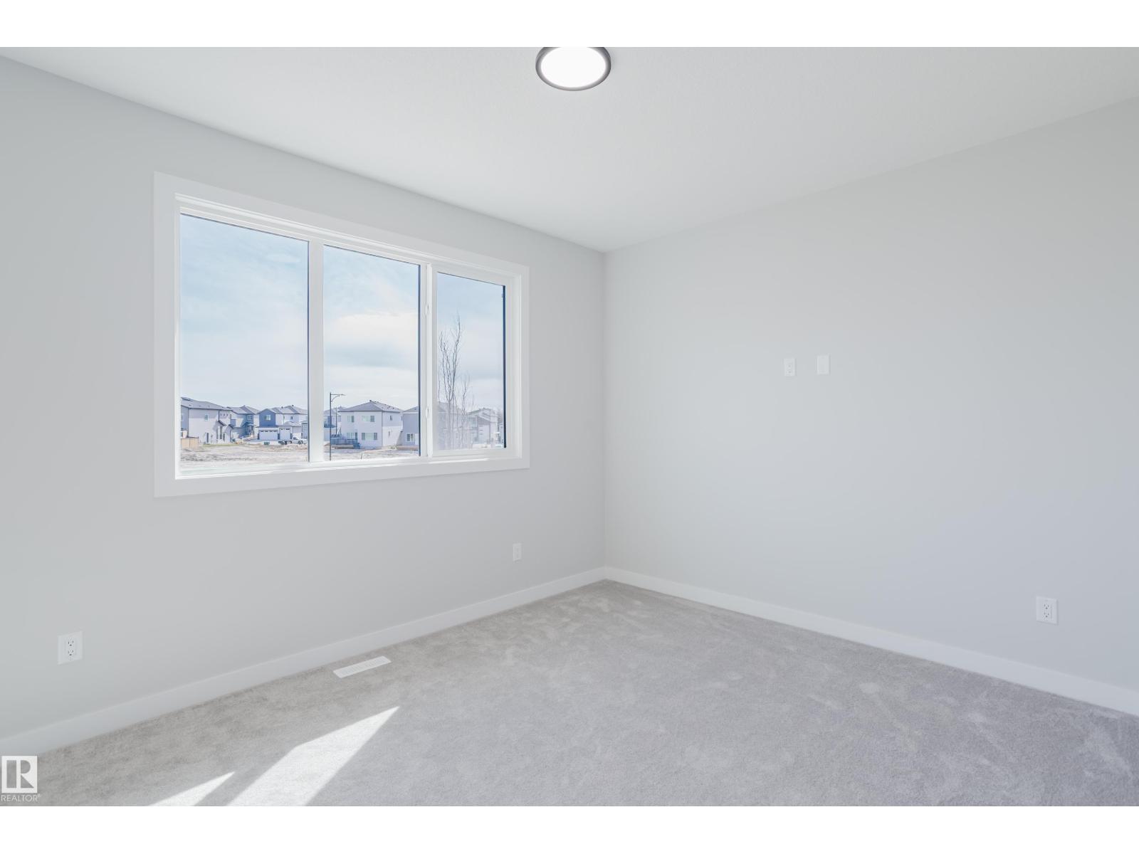 Photo 23 of 147 Caledonia Dr, Leduc AB