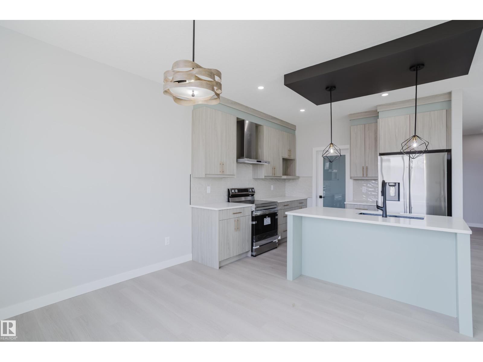 Photo 58 of 147 Caledonia Dr, Leduc AB