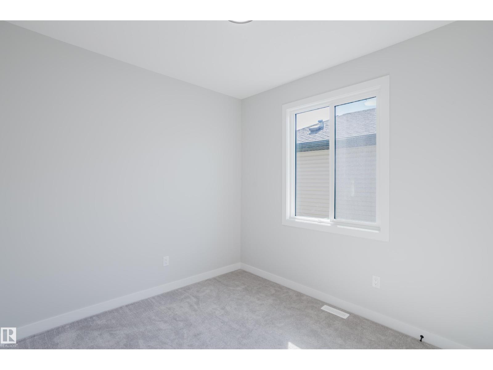 Photo 18 of 147 Caledonia Dr, Leduc AB