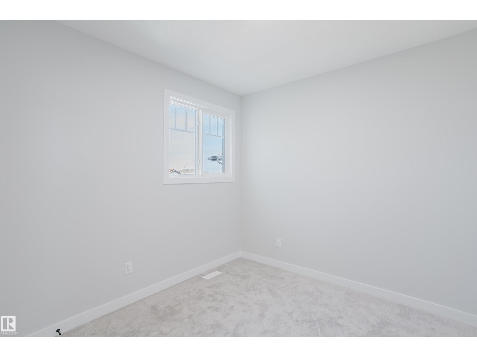 Photo 12 of 147 Caledonia Dr, Leduc AB