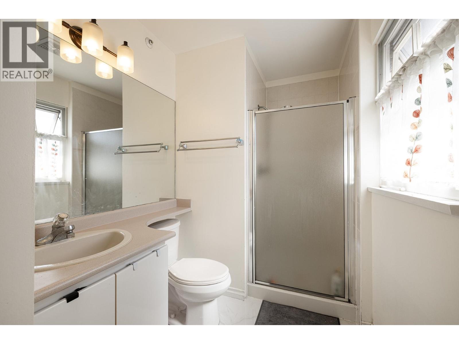 Photo 3 of 8573 Laurel Street, Vancouver BC