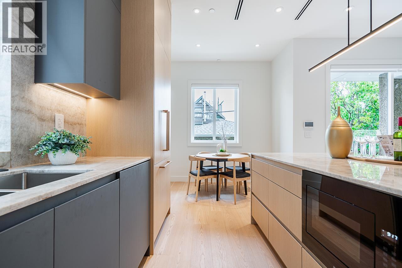 Photo 13 of 2561 W 2nd Avenue, Vancouver BC