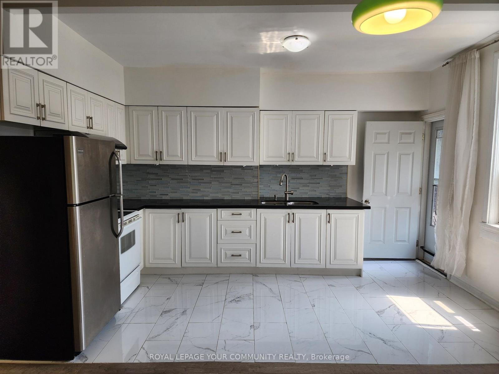 Photo 5 of Upper Floor 1075 Gerrard Street E, Toronto ON